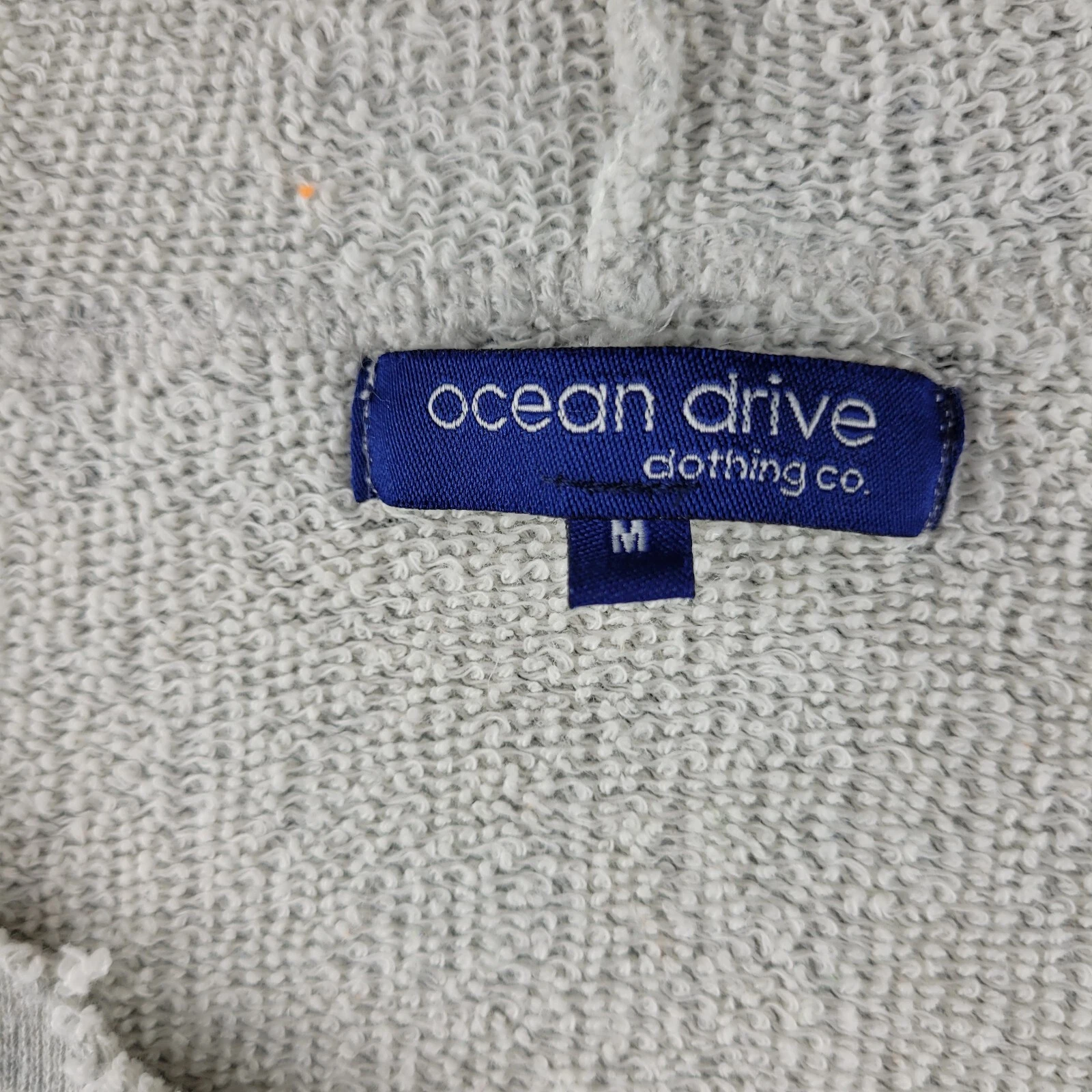 VETEMENTS Ocean Drive Clothing Co Felpa con Cappuccio Ragazze Grigio Medio Destinazione Vacanze Pullover