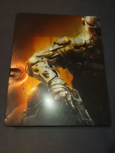 Call of Duty Black Ops III PS4  états de jeu STEELBOOK a une bosse sur la boite.