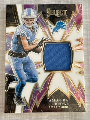 Amon-Ra St. Brown /75 (Jersey) 2023 Panini Select -Sparks #SP-AST