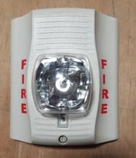 System Sensor SWK  with mounting back plate.  NO WEATHERPROOF BACK BOX