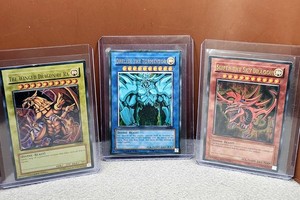 yugioh god cards ebay Amazon.com: YUGIOH: OBELISK SLIFER RA - ULTRA RARE HOLO NM - EGYPTIAN GOD  CARDS