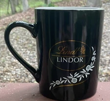 LINDT LINDOR Chocolate COFFEE Tea  MUG Shiny Black with gold Maud Borup 2 sided