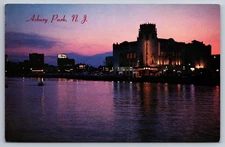 Vintage Postcard- Asbury Park and reflections at night from Wesley Lake NJ