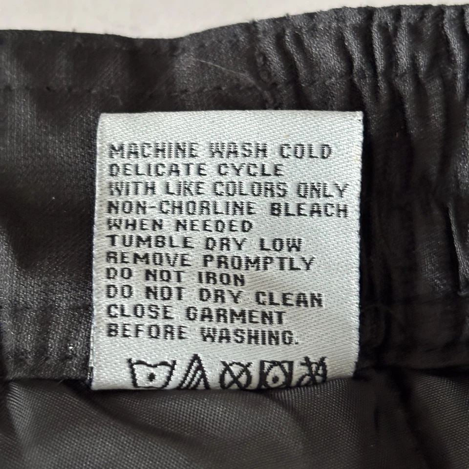 Pantalones de nieve para mujer Snozu XL doble tobillo ajustable cintura bolsillos negros usados en excelente estado Foto 3 de 4