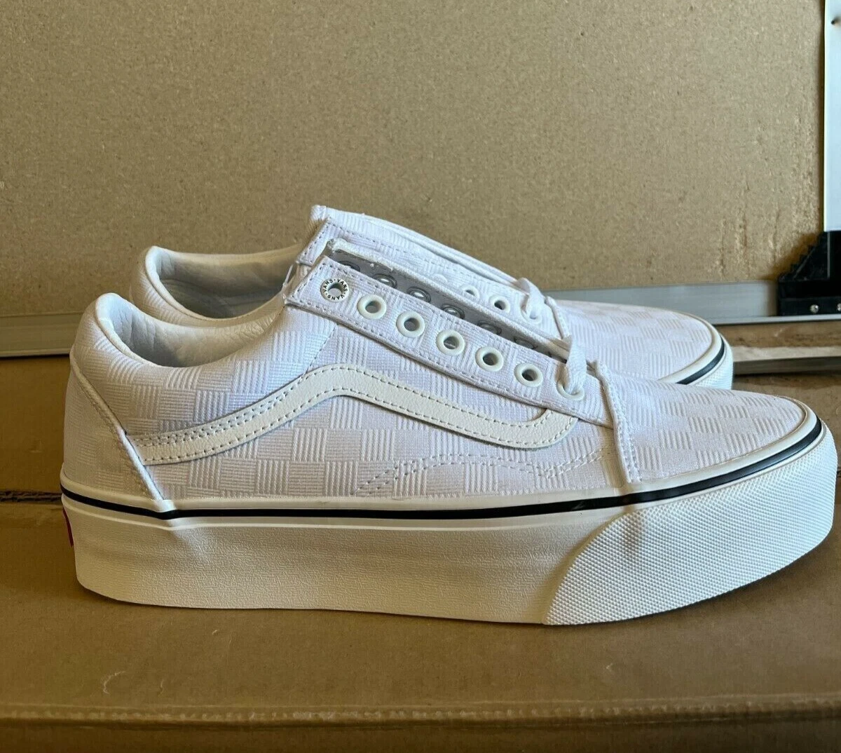 White checkerboard lace up vans store
