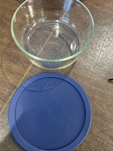 Pyrex 4-Cup Clear Glass Round Storage Bowl with Blue Plastic Lid.