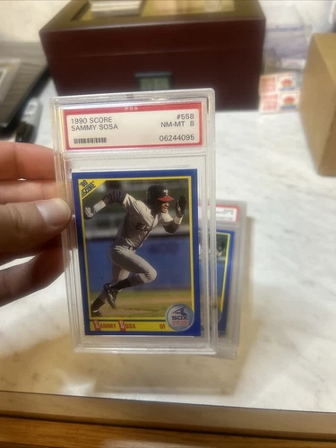 1990 Score - #558 Sammy Sosa (RC) PSA-8 Vintage Holder.