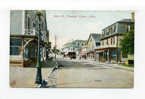 Vineyard Haven MA postcard, street view, stores, tiny people, lamp decorations