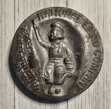 Vintage National Lead Company Paper Weight Dutch Boy Anti-Friction Cast Metal