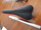 Cionlli Cushioned Black/Red Bike Seat with post from a Mongosse Bike