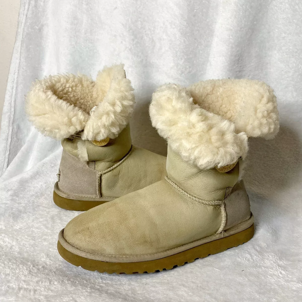 UGG Bailey button fold over white sand tan shearling boots women s