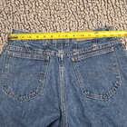 Blue high-waisted L.L.Bean mom jeans with front pockets, yellow measuring tape, and white size 12 label on waistband.