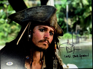 Johnny Depp Pirates of the Caribbean Signed “Jack Sparrow” 11x14 PSA/DNA 10