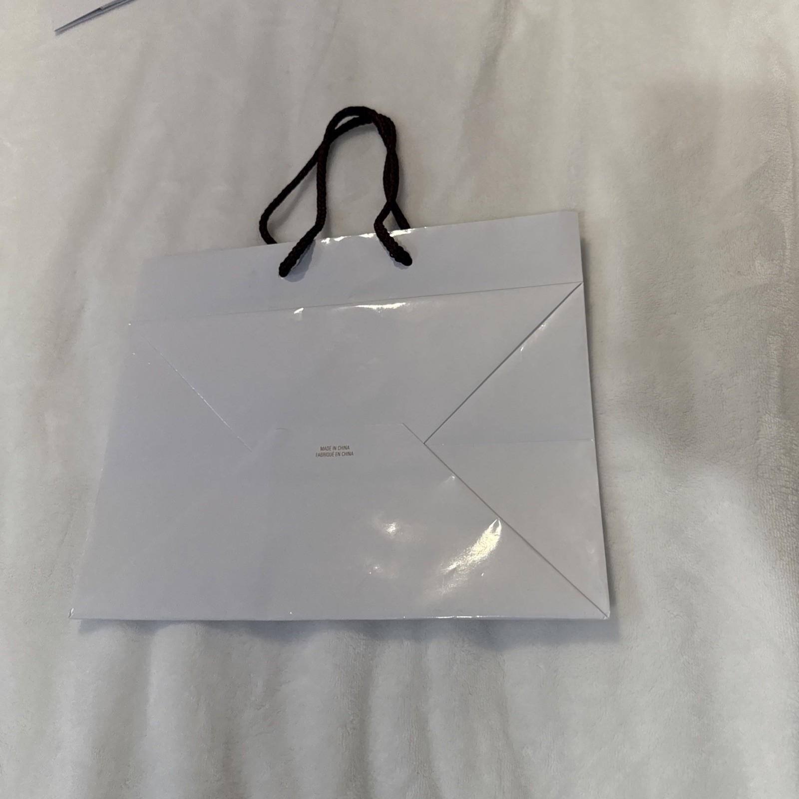 White Godiva chocolatier paper bag With Brown Straps