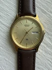 Vintage 1990s Seiko SQ Daydate 34mm 5Y23 Quartz Watch