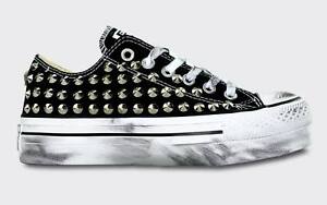 converse nere con platform