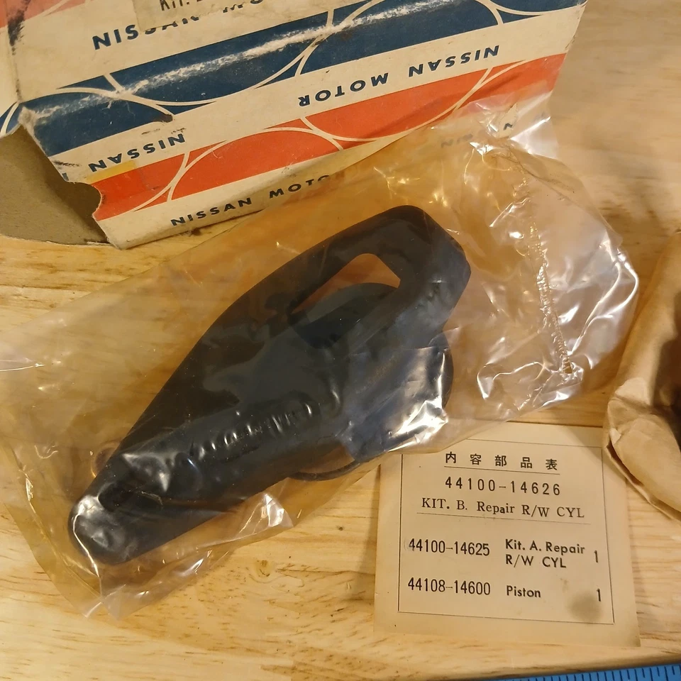 Kit de reparación de cilindro de rueda Nissan Datsun 1973-1979 44100-14626 nuevo de lote original Bluebird Foto 2 de 3