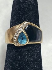 Bague homme or 14 carats sertie de canaux diamant noir onyx bleu topaze