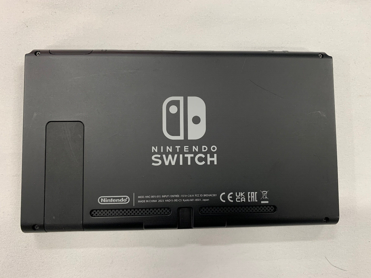 Nintendo Switch 32GB Handheld Console With Gray Joy Con Good Nintendo Switch 32GB Handheld Console With Gray Joy Con Good