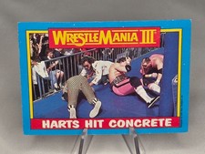 1987 Topps WWF/WWE #57 Harts Hit Concrete Brett Hart / Neidhart / Jimmy Hart