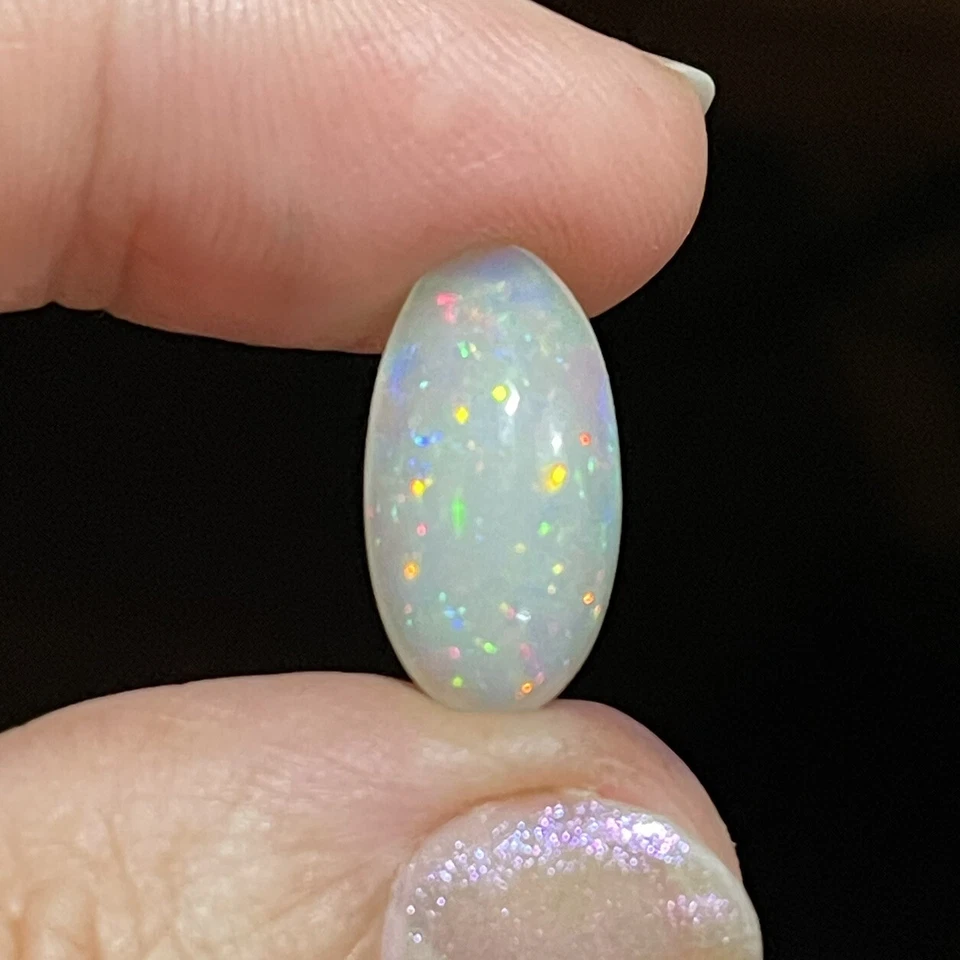 4.7ct 18x9.4x6mm Sparkling Stardust Oval Ethiopian Welo Opal Gemstone Loose Gem - Image 3 of 4