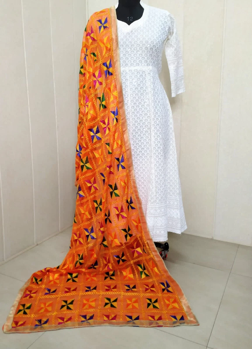 White dress clearance with orange dupatta