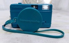 Lomography Fisheye Turquoise/Teal 35mm Film Camera With Cap and Strap