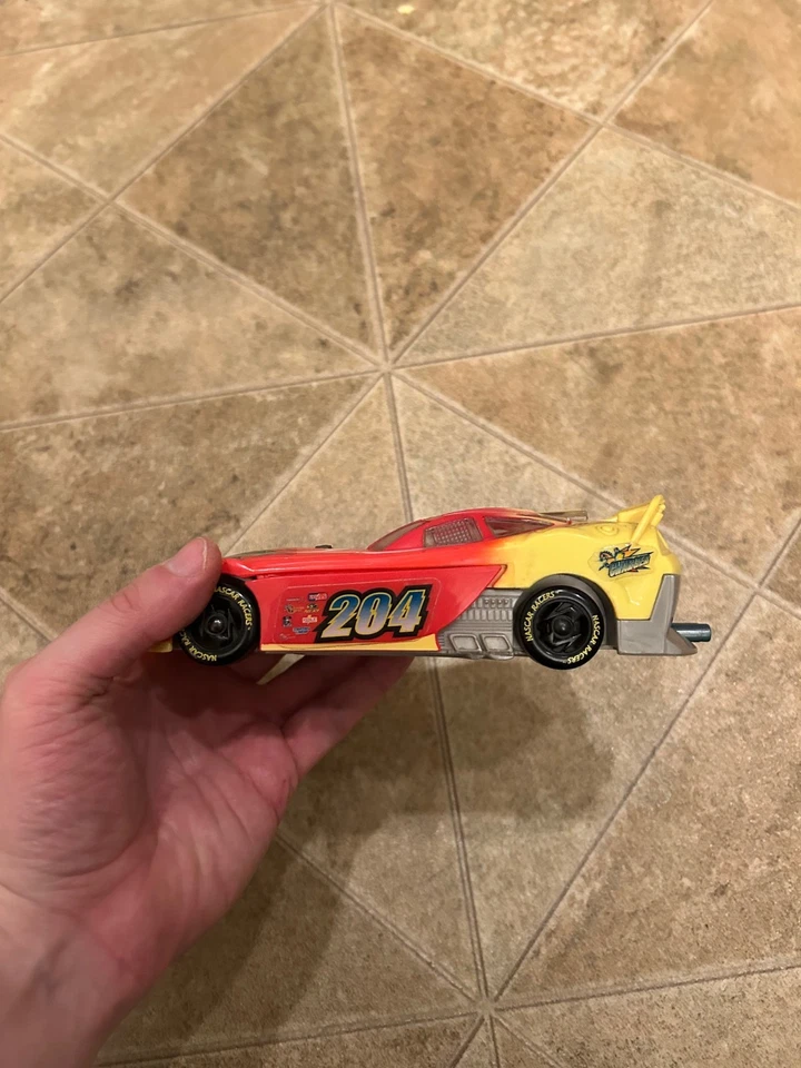 Hasbro NASCAR Racers "Charger" Mark McCutchen 204 figure + car - Image 3 of 4