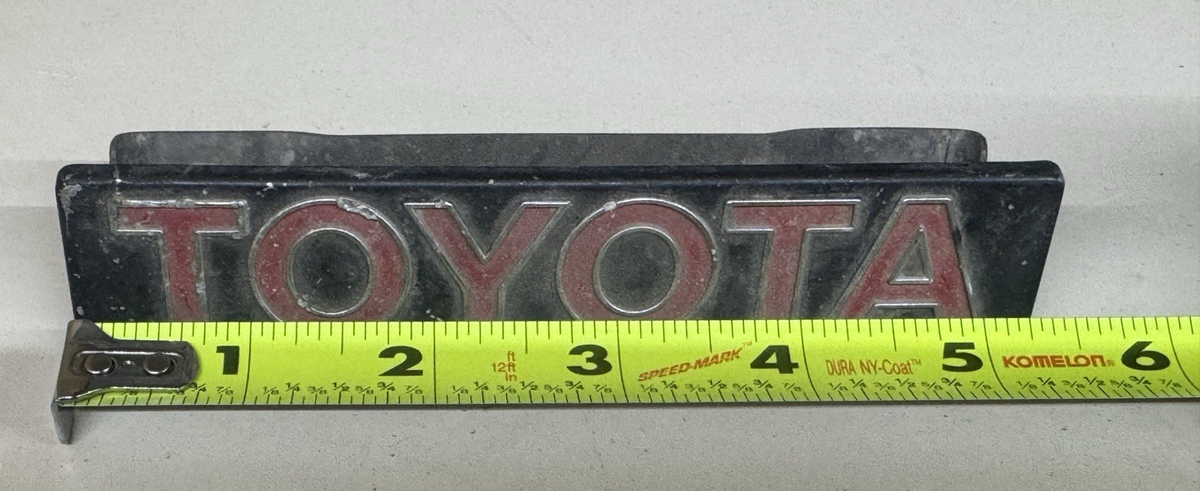 1975-1980 Toyota Corolla Grill Emblem Trim Molding 75311-12570 for
