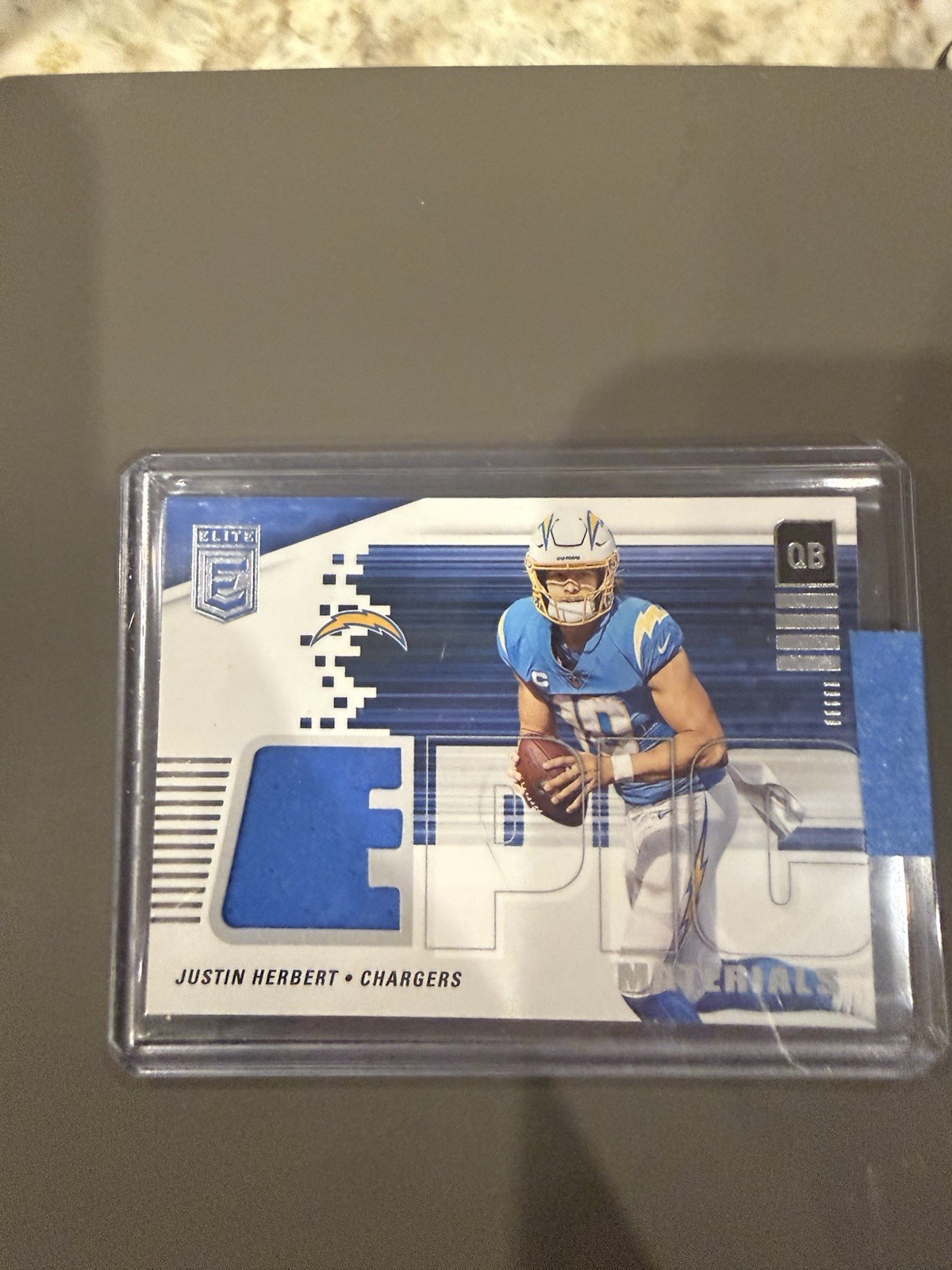 Panini 2022 Donruss Elite Justin Herbert Chargers #EM-2 Epic Materials Memo
