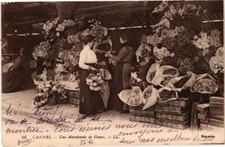 Old postcard Ak Cannes Une Merchante de Fleurs (262153)