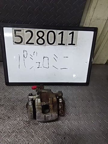 MITSUBISHI Pajero Mini 2010 zacisk przedni lewy MR334908 [Używany] [PA116476061] - Zdjęcie 1 z 3