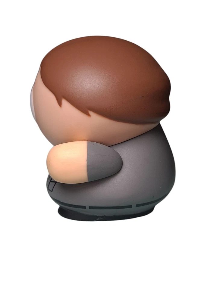 Figura de agente de la Patrulla de Carreteras Kidrobot South Park muchas caras de Eric Cartman Foto 2 de 4