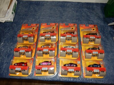JADA  OPTION D DIECAST SET 1.64  COMPLETE SET FRESH OUT OF THE CASE. 12 PIECE