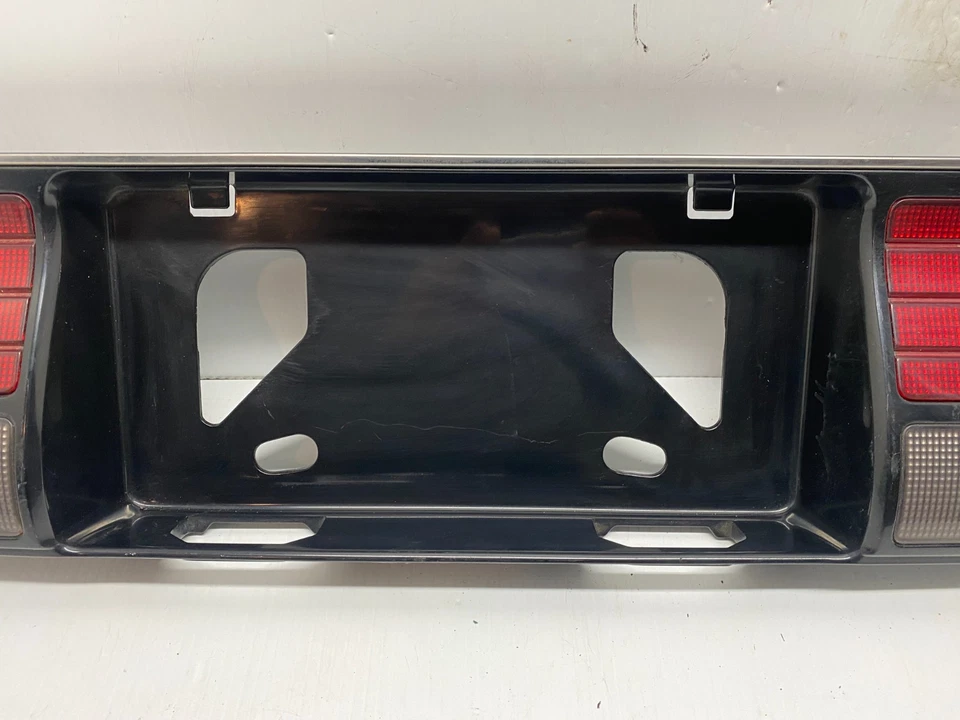 1990-1992 MITSUBSHI GALANT LICENSE PLATE TRIM PANEL MIDDLE TAILLIGHT OEM, - Image 3 of 4