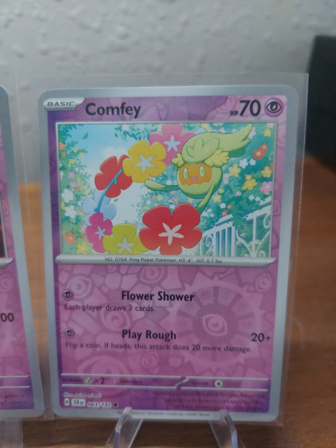 Comfey - 063/142 Stellar Crown REVERSE Holo Pokemon - NM/MINT