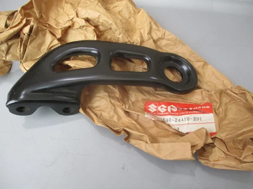 BRACKET, HEAD LAMP, LH *{BLACK}*