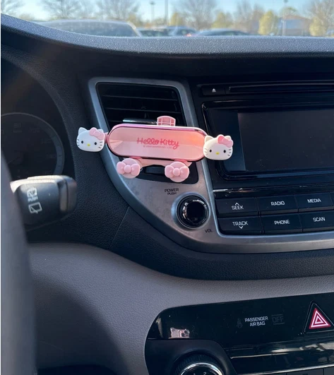 Nuevo Sanrio Hello Kitty Rosa Coche Manos Libres Teléfono Soporte Ventilación Fácil Clip Montaje Foto 3 de 4