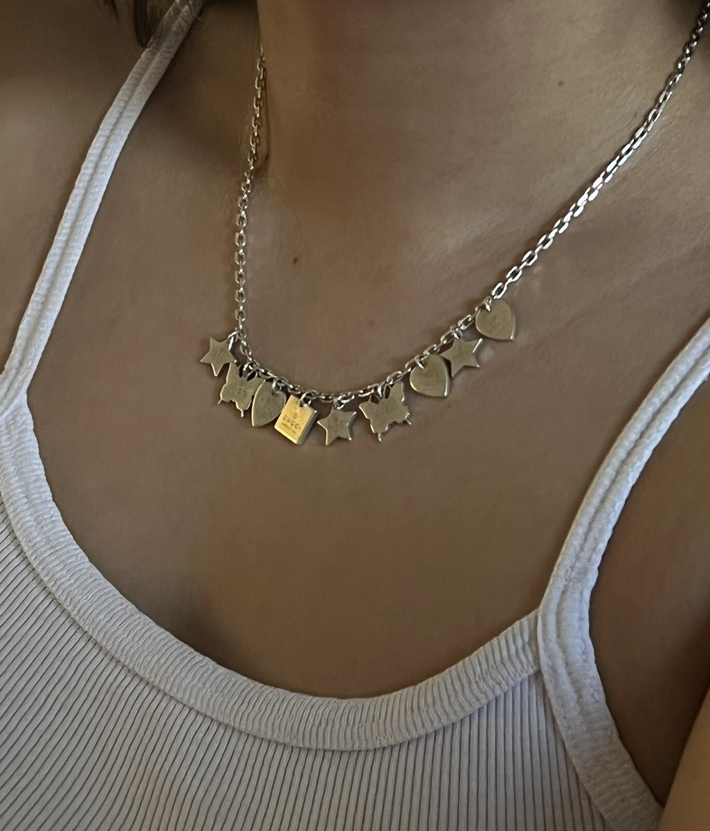 Authentic Gucci Sterling Silver Heart Butterfly Star Logo Authentic Gucci Sterling Silver Heart Butterfly Star Logo