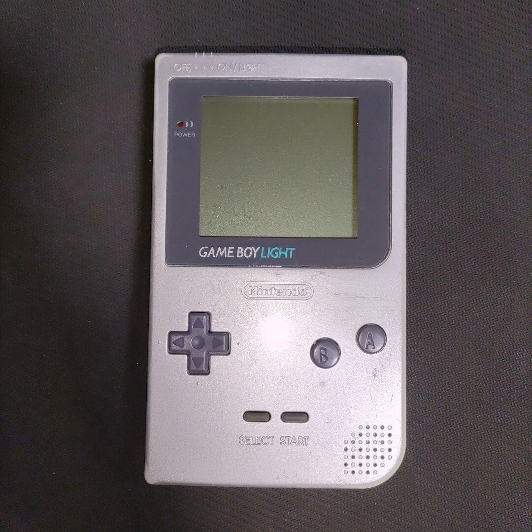 Nintendo Game Boy Light SILVER console MGB-101 WORKING Nintendo Game Boy Light SILVER console MGB-101 WORKING