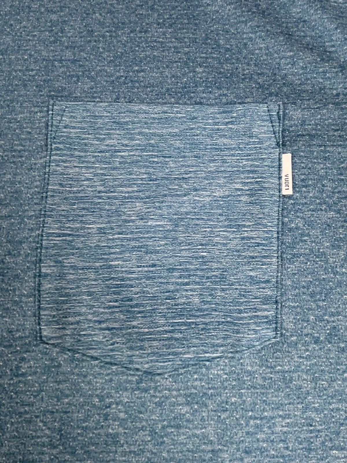 vuori heather tradewind pocket performance gym shirt