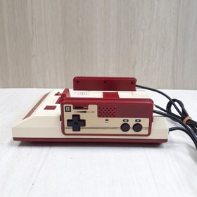 Japanese original Famicom in box with 8 games Family Computer HVC-001 1983 CIB