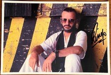 RINGO STARR of THE BEATLES  Signed  glossy 5 1/4 x 7 1/4 color photo