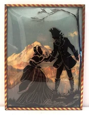 1930’s Reverse Painted Silhouette on Convex Glass Colonial Couple in Mountains