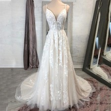 Elegant Champagne A-Line Wedding Dresses Lace Applique V-Neck Beaded Bridal Gown