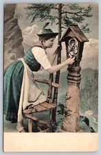 Vintage Postcard Woman in Dirndl at Alpine Shrine Germany Austria Alps