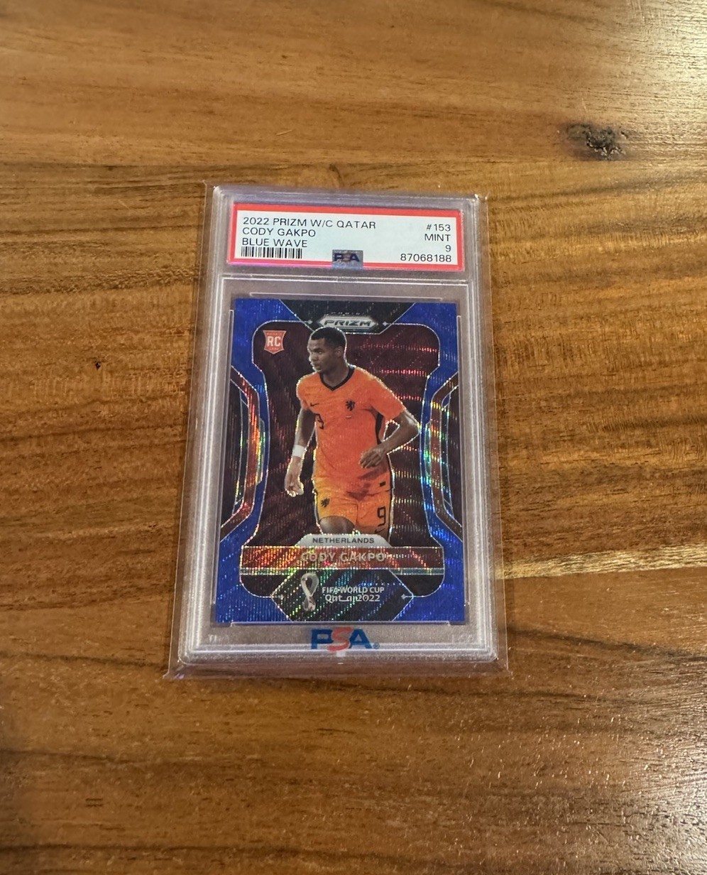 Cody Gakpo 2022 Panini Prizm World Cup Qatar Blue Wave /199 Rookie RC PSA 9 MT