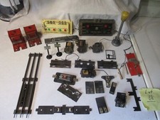 Lot of Marx parts,uncouples,switch boxes,reverse units,etc see pictures