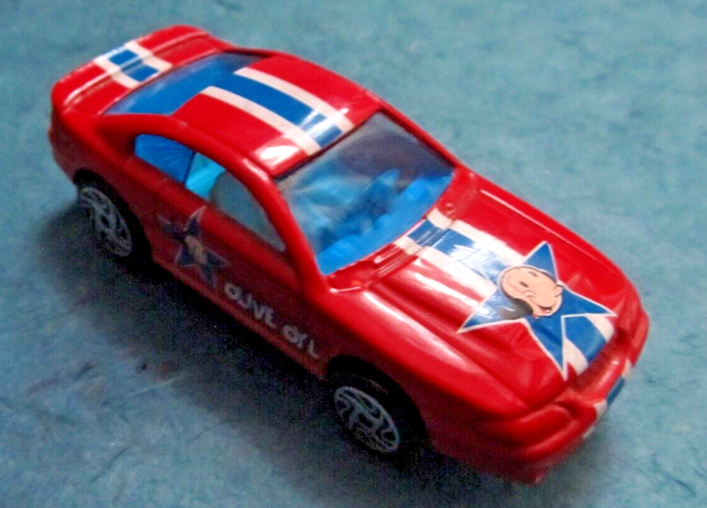 Red '97 Mustang Olive Oil Racing Champions toy car fridge magnet