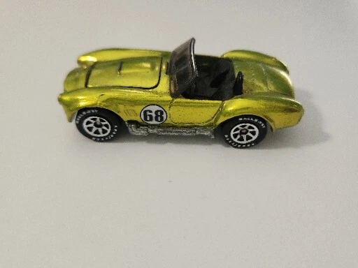 Ford Shelby Cobra 427 1982 Hot Wheels amarillo anticongelante capó convertible abierto Foto 3 de 4